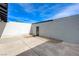 Backyard with concrete and rock landscaping, with block wall surrounding for privacy at 3924 Blackford Pl, Las Vegas, NV 89102