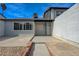 Cozy backyard featuring a concrete patio, rock garden, and block wall for privacy at 3924 Blackford Pl, Las Vegas, NV 89102
