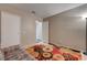 Cozy bedroom featuring a large, colorful floral rug and neutral wall paint at 3924 Blackford Pl, Las Vegas, NV 89102
