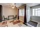 Bright dining area with tile floors, a ceiling fan and large window at 3924 Blackford Pl, Las Vegas, NV 89102