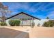 Charming home featuring a pergola, desert landscaping, and ample natural light at 3924 Blackford Pl, Las Vegas, NV 89102