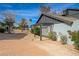 Cozy townhome features a pergola entryway and desert landscaping at 3924 Blackford Pl, Las Vegas, NV 89102