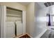 Laundry area with white washer and dryer units behind folding doors at 3924 Blackford Pl, Las Vegas, NV 89102