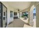 Covered outdoor patio area offering shade, seating, and backyard access at 4504 Dunlap Crossing St, Las Vegas, NV 89129