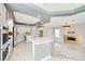 Open-concept kitchen with marble countertops, island, and stainless appliances at 4504 Dunlap Crossing St, Las Vegas, NV 89129