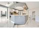Kitchen features white cabinetry, pendant lighting, and modern appliances at 4504 Dunlap Crossing St, Las Vegas, NV 89129