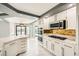 Kitchen boasts stainless steel appliances, white cabinets and marble countertops at 4504 Dunlap Crossing St, Las Vegas, NV 89129