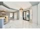 Open kitchen and dining area featuring an island and patio access at 4504 Dunlap Crossing St, Las Vegas, NV 89129