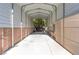 Long carport providing covered parking and storage space at 5193 N Miller Ln, Las Vegas, NV 89149