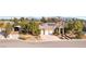 Beautiful single-story home with a tile roof, solar panels, an oversized three-car garage, and mature landscaping at 5193 N Miller Ln, Las Vegas, NV 89149