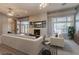 Airy living room features neutral color scheme and bright lighting at 5193 N Miller Ln, Las Vegas, NV 89149
