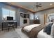 Cozy main bedroom features a home office and walk-in closet at 5193 N Miller Ln, Las Vegas, NV 89149
