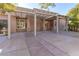 Expansive covered patio ideal for outdoor entertaining with custom fountain at 5193 N Miller Ln, Las Vegas, NV 89149