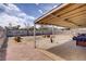 Backyard features a covered patio, providing shade and an outdoor living space for enjoyment at 5463 Waltham Ln, Las Vegas, NV 89122