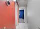 Hallway showcasing ceramic tile floors and access to bedrooms at 5463 Waltham Ln, Las Vegas, NV 89122