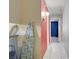 Bright laundry room featuring ceramic tile floors, modern washer, and fresh neutral paint at 5463 Waltham Ln, Las Vegas, NV 89122