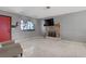 Living room with fireplace, tile floors and window providing natural light at 5463 Waltham Ln, Las Vegas, NV 89122