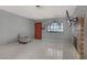 Bright living room with tile floors, a fireplace and entry door at 5463 Waltham Ln, Las Vegas, NV 89122