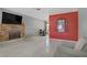 Bright living room with a brick fireplace, TV and neutral tile flooring at 5463 Waltham Ln, Las Vegas, NV 89122