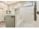 Modern bathroom with a frameless glass shower, a built-in bench, and elegant fixtures for a spa-like experience at 5790 Douglas Everett St, Las Vegas, NV 89120