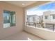View from a modern balcony with a view of a courtyard and neighboring townhomes at 600 N Carriage Hill Dr # 2098, Las Vegas, NV 89138