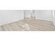 Bright bedroom with wood-look flooring and en suite bathroom at 600 N Carriage Hill Dr # 2098, Las Vegas, NV 89138