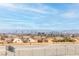 City view with a distant skyline, and residential homes in the foreground at 600 N Carriage Hill Dr # 2098, Las Vegas, NV 89138