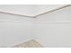 A walk-in closet with shelving and wood flooring at 600 N Carriage Hill Dr # 2098, Las Vegas, NV 89138