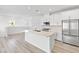 Bright, modern kitchen with stainless steel appliances and island at 600 N Carriage Hill Dr # 2098, Las Vegas, NV 89138