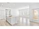 Bright open-concept living area with an island kitchen and stainless steel appliances at 600 N Carriage Hill Dr # 2098, Las Vegas, NV 89138