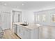 Open kitchen layout with island and spacious living area at 600 N Carriage Hill Dr # 2098, Las Vegas, NV 89138