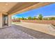 Backyard featuring gravel, brick walls, turf area, and stone pavers at 6280 Lamont Hills Ave, Las Vegas, NV 89139