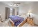 This primary bedroom has large nightstands and a window for natural light at 6280 Lamont Hills Ave, Las Vegas, NV 89139