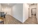 View of the hallway with hard floors and white walls at 6280 Lamont Hills Ave, Las Vegas, NV 89139
