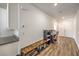 Hallway area boasts durable wood-look floors and offers versatile space for a home office at 6280 Lamont Hills Ave, Las Vegas, NV 89139