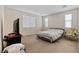 Large bedroom features two windows that let in plenty of natural light at 6417 Giant Oak St, North Las Vegas, NV 89084