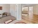 Inviting entryway featuring a mix of carpet and hardwood flooring at 6417 Giant Oak St, North Las Vegas, NV 89084