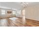 Open living room with hardwood floors, neutral walls, and ample natural light at 6417 Giant Oak St, North Las Vegas, NV 89084