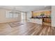 Open-concept living area with hardwood floors, recessed lighting, and seamless transitions to other spaces at 6417 Giant Oak St, North Las Vegas, NV 89084
