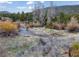 Picturesque creek winding through a verdant landscape, with the property nearby offering a tranquil retreat at 660 E Aspen Meadow Dr, Mammoth Creek, UT 84735