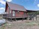 Charming cabin with a large deck perfect for outdoor living and enjoying the surrounding nature at 660 E Aspen Meadow Dr, Mammoth Creek, UT 84735