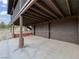 Spacious garage with multiple doors and sturdy support beams offering plenty of parking and storage at 660 E Aspen Meadow Dr, Mammoth Creek, UT 84735