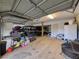 Well-lit garage featuring ample storage space, a utility vehicle, and additional workspace at 660 E Aspen Meadow Dr, Mammoth Creek, UT 84735