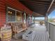 Inviting outdoor patio with mountain views, complete with a fireplace, comfortable seating, and rustic barrel accents at 660 E Aspen Meadow Dr, Mammoth Creek, UT 84735