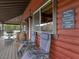 Inviting outdoor porch with comfortable lounge chairs, mountain views, and 