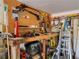 Organized workbench area with a variety of tools and equipment, perfect for DIY projects and maintenance at 660 E Aspen Meadow Dr, Mammoth Creek, UT 84735