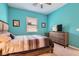 A peaceful bedroom boasts neutral décor, providing a relaxing space for rest and rejuvenation at 759 Praire Plume St, Henderson, NV 89011