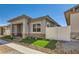 Charming single-story home features stucco siding, brick accents, neat landscaping and a cozy covered front porch entry at 759 Praire Plume St, Henderson, NV 89011