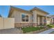 Charming single-story home features stucco siding, brick accents, neat landscaping and a cozy covered front porch entry at 759 Praire Plume St, Henderson, NV 89011