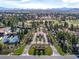 Stunning aerial view of the community, showcasing lush landscaping, a golf course, and beautiful homes at 7969 Bermuda Dunes Ave, Las Vegas, NV 89113